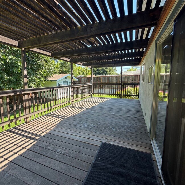 Building Photo - Adorable house with large deck,  yard and RV access