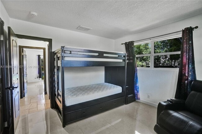 Building Photo - 3100 NE 56th Ct