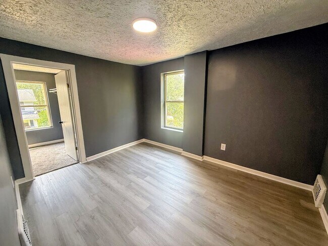 Building Photo - Three bedroom one bathroom single-family home for rent