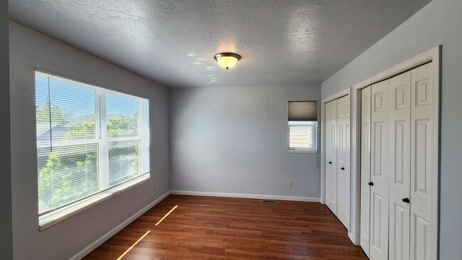 Building Photo - Beautiful House with Yard and Pets Considered