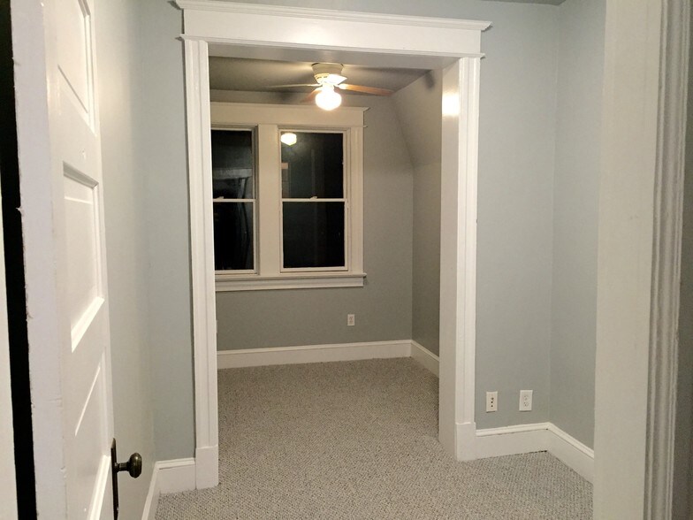 The upstairs bedrooms are carpeted. - 1110 4th St NE