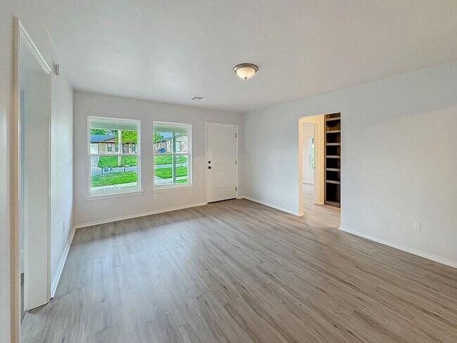 Building Photo - FOR RENT: Charming 2-Bedroom Home with a Versatile Bonus Room!