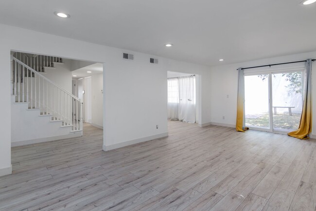 Building Photo - 5-Bedroom, 3-Bathroom Home with Solar Pane...