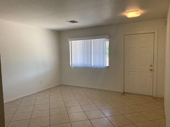 Building Photo - Four Bedroom Home with Utilities included!