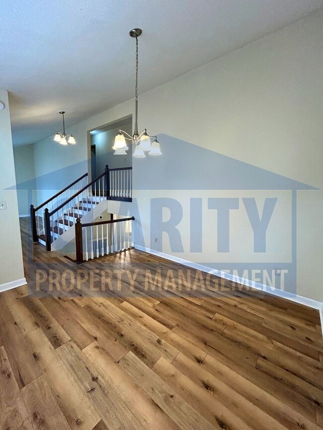 Building Photo - Three bedroom home w/ two bonus rooms!