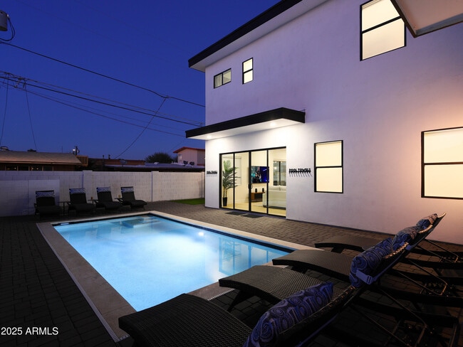 Building Photo - 7520 E Highland Ave