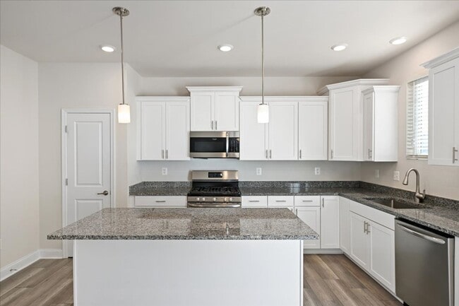 Building Photo - 1 month free with 24-month lease! Attracti...