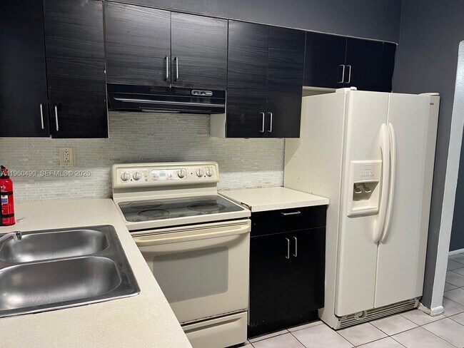 Building Photo - 1439 NW 8th Ave