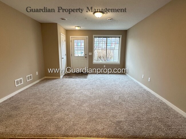 Building Photo - North Brooklyn Park Town Homes, Dedicated Office, 2 Car Garage, Washer/Dryer, Front Patio