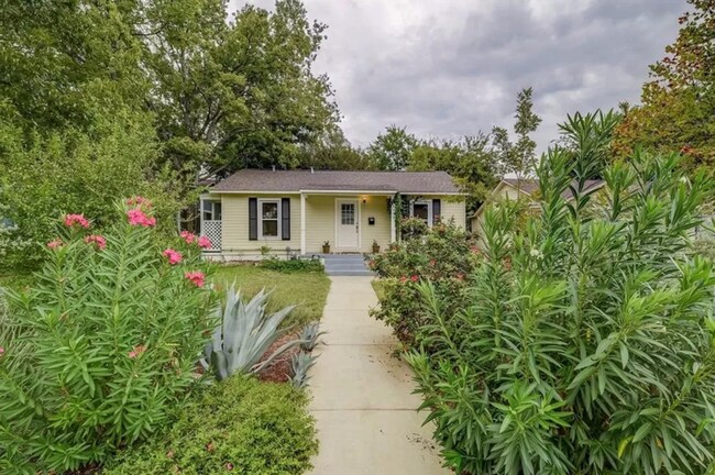 Building Photo - Discover Your Austin Oasis: Revitalized Bungalow with Hardwood Floors and Entertainer's Deck!