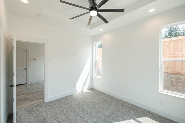 Building Photo - NEW CONSTRUCTION 1BD W/GARAGE & YARD