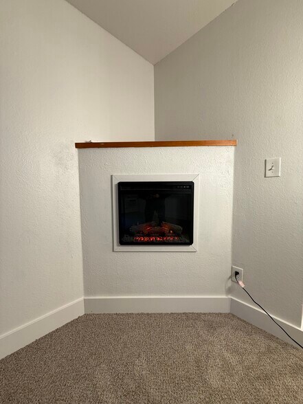 Electric built in fireplace - 6555 SW Terri Ct