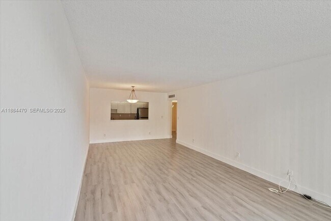 Building Photo - 19380 Collins Ave