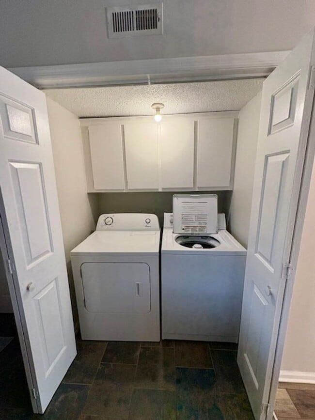 Building Photo - Charming End Unit Two Bedroom Townhome on ...