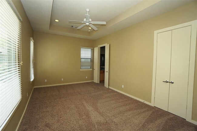 Building Photo - Elegant Gated Townhome Offering Unparallel...