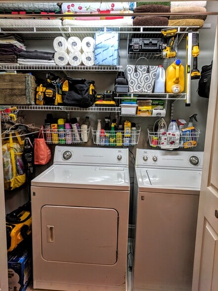 Laundry and storage closet in hall area off main living room - 1627 Nassau Blvd