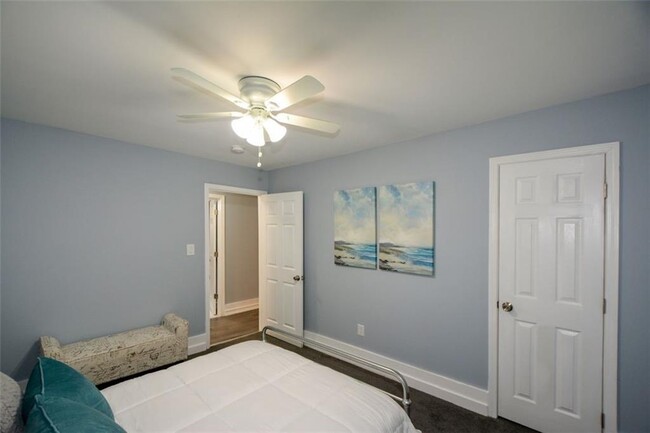 Building Photo - Modern 2BR/2BA Apartment with Private Deck...