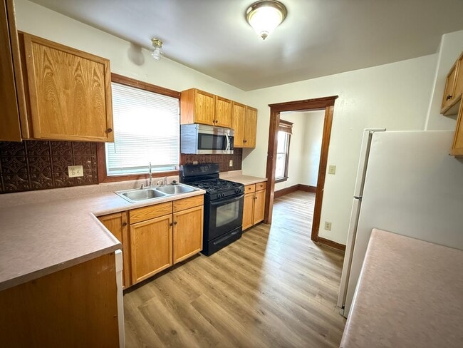 Building Photo - Spacious Historical Three-Bedroom Home with Classic Character- NEW FLOORING