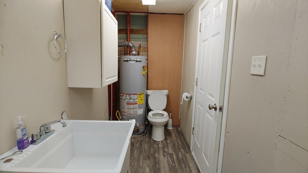 half bath, area shared with washer and dryer - 708 Vincent St