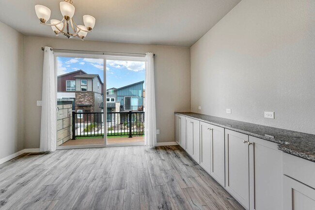 Building Photo - Modern 4BR with Open Kitchen, Patio & 2-Car Garage