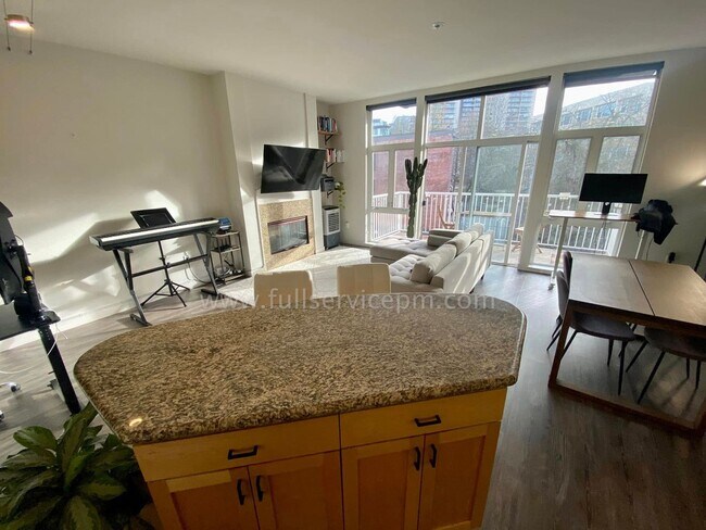 Building Photo - Stylish Capitol Hill Loft Condo w/ Floor-to-Ceiling Windows, Gas Fireplace