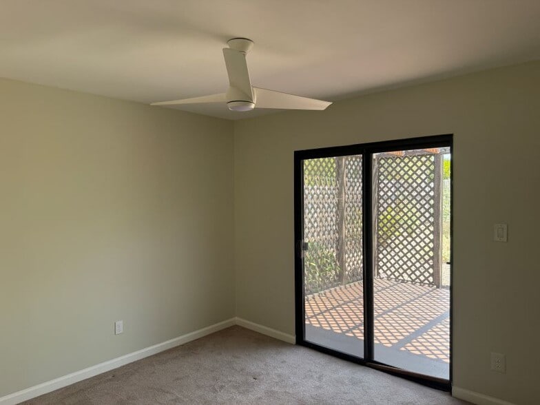 Bedroom facing covered patio and gardenand - 3112 Idlewild Way
