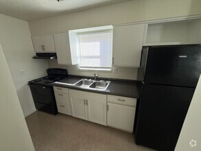 Building Photo - Discover your new home in a 1-BR, 1-BA apa...