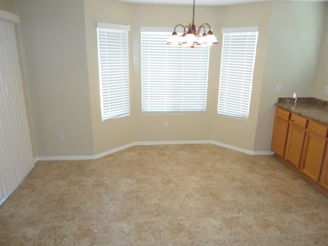 Building Photo - 10542 W La Reata Ave