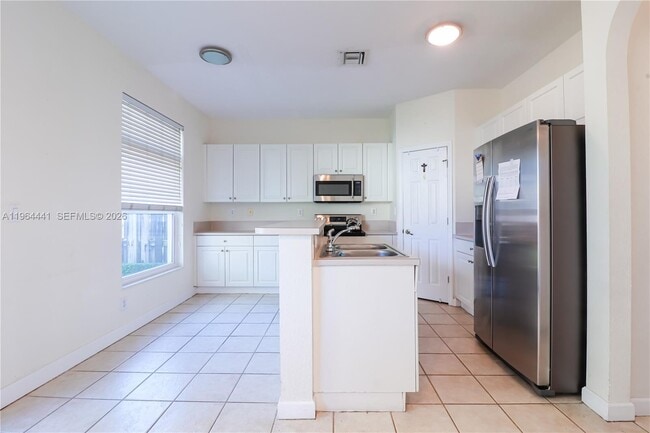 Building Photo - 5663 NW 112th Pl