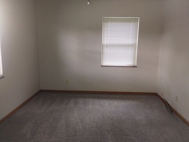 Building Photo - Quaint Duplex with a private Basement, Garage Space & Patio