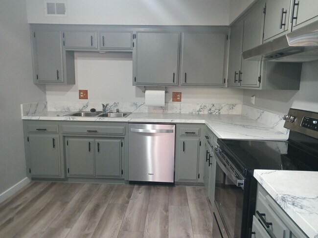 Building Photo - Desirable Two-Story Condo in the North East