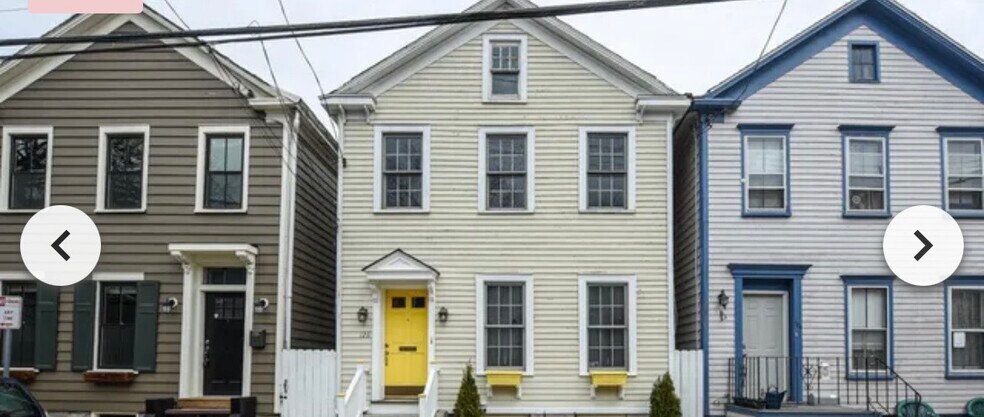 Yellow door house - 126 N College St