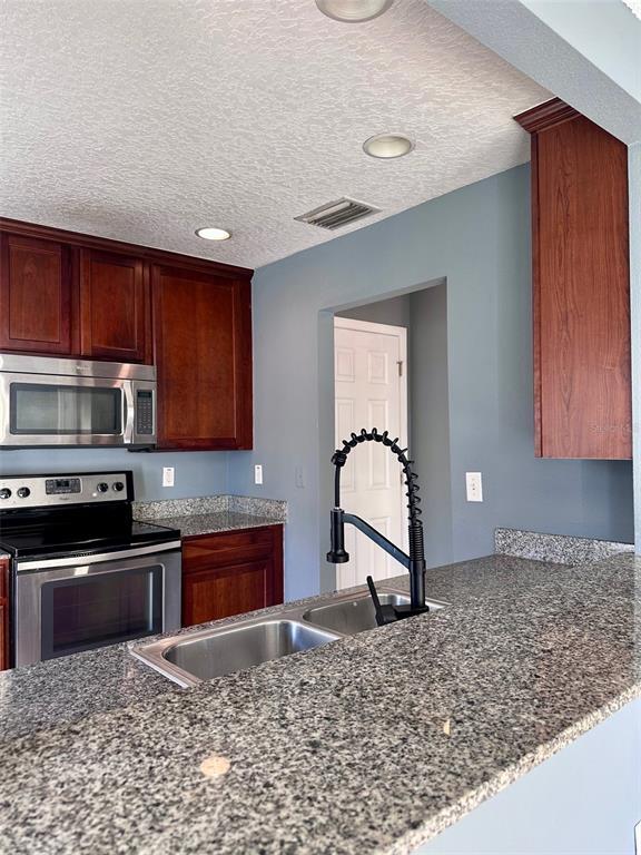 Building Photo - 5393 River Rock Rd