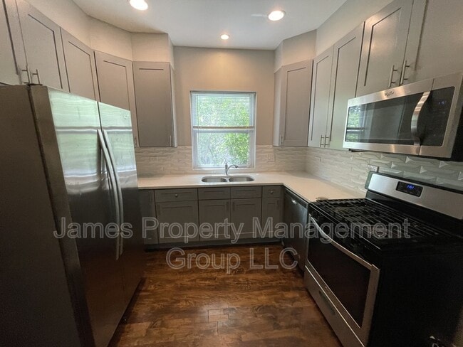 Building Photo - 5669 N Magnolia Ave