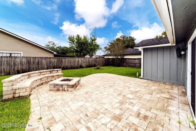 Building Photo - 7119 Swamp Flower Dr N