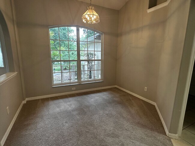 Building Photo - Coming Available Soon - 3/2 Split Plan Home in Eustis with Screened Porch!