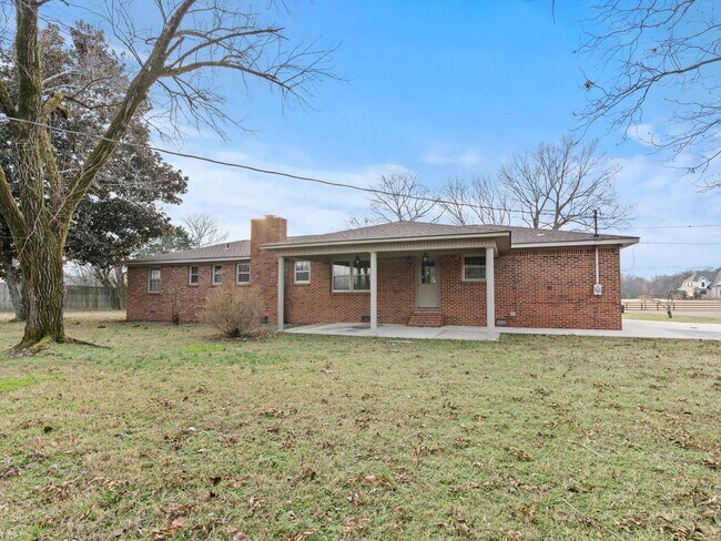 Building Photo - Charming 4-bedroom, 2-bath ranch-style home situated on just over 2 acres!