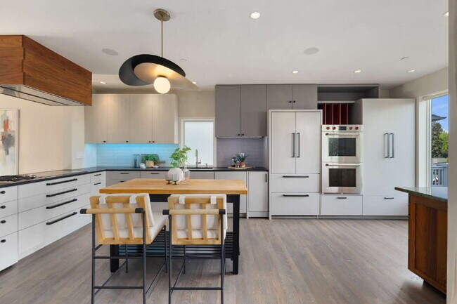 Building Photo - Architectural Madrona Retreat with Panoramic Lake Washington Views, Solar & Detached Office- Avai...