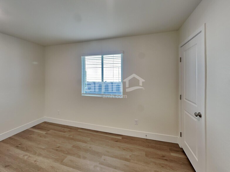 Building Photo - 8917 Dwarf Chin Ave