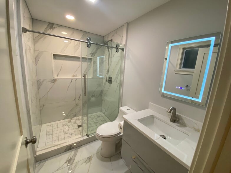 Each Bath room with shower - 585 Highland Ave