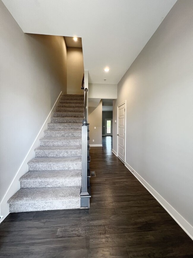 Building Photo - SEE IT NOW: Modern 3-Bedroom Townhome with...