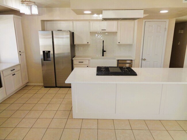 Building Photo - Exquisite Single Level Upper Valley Home With Refrigerated Air Located In Quiet Neighborhood