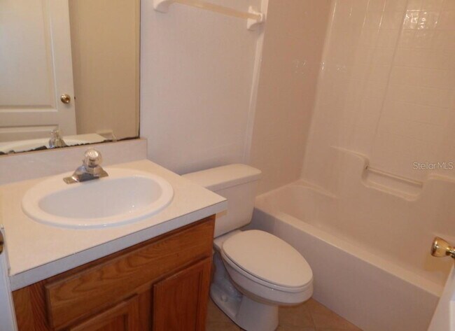 Building Photo - **Charming 4BR/2BA Pond-View Home with Boat Ramp Access – East Orlando **