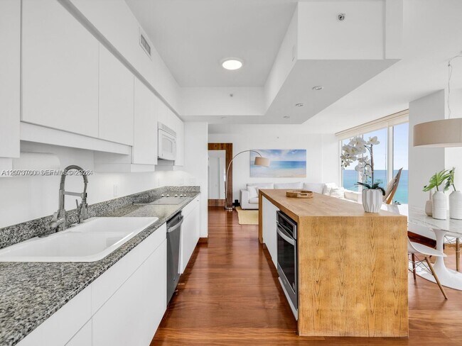 Building Photo - 4779 Collins Ave