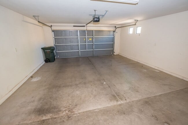 Building Photo - Gorgeous 3 Bedroom 2 Bathroom Home with Tile Throughout! Central A/C, 2 Car Garage!