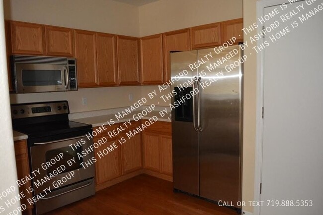 Building Photo - 5937 Ensemble Heights