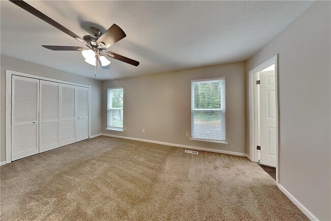 Building Photo - 6627 Windwood Cir