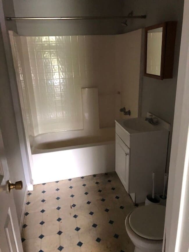 Building Photo - One bedroom - partially furnished
