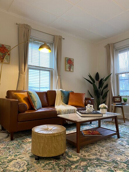 Leather sofa with side table and reading floor lamp - 52 Pomeroy Ave
