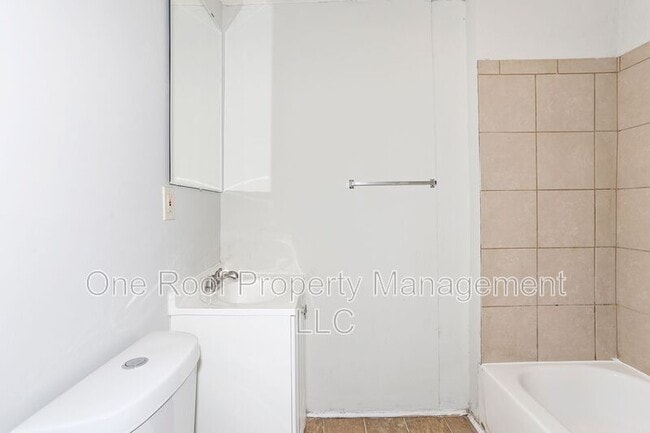 Building Photo - 3228-3230 E 8th St.